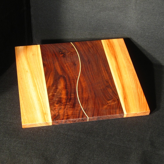 C90 - claro walnut with sinuous curves