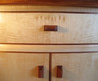 Veneered drawer and doors with blackwood surrounds