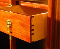 Hand-sawn dovetails on inner drawers