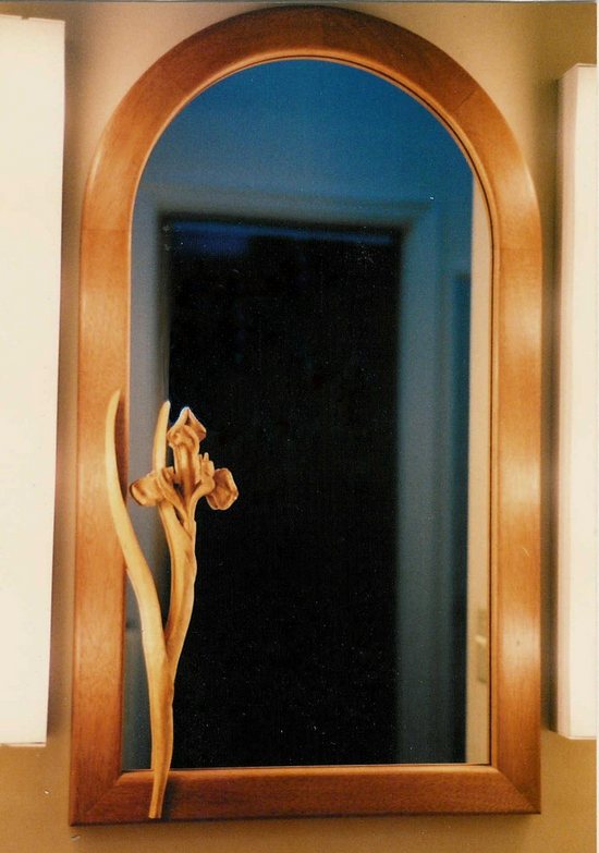 Mirror with carved lily